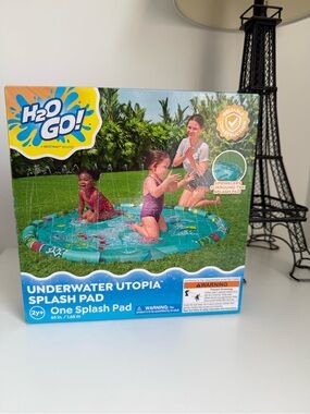 Utopia Splash Pad  Kid in Teal with Multicolor Accents